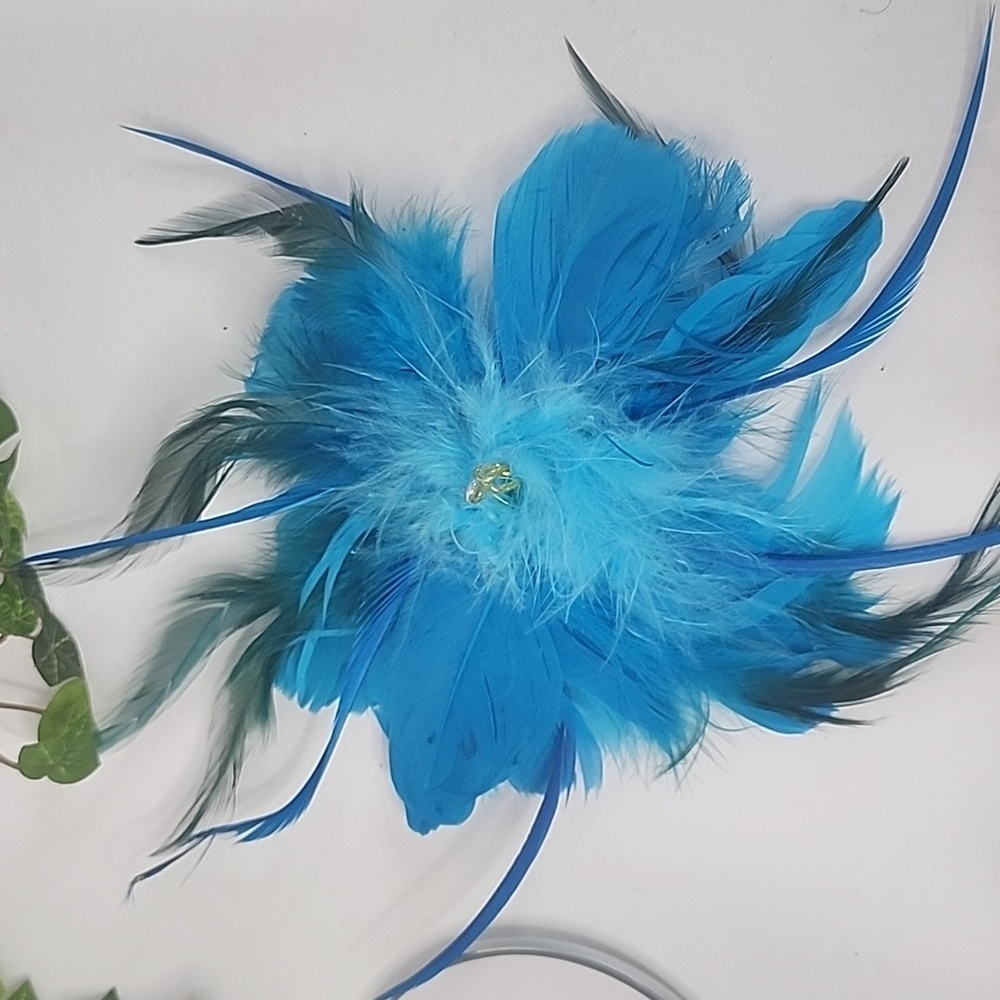Bright Teal Feather Hair Clip with Decorative Center
